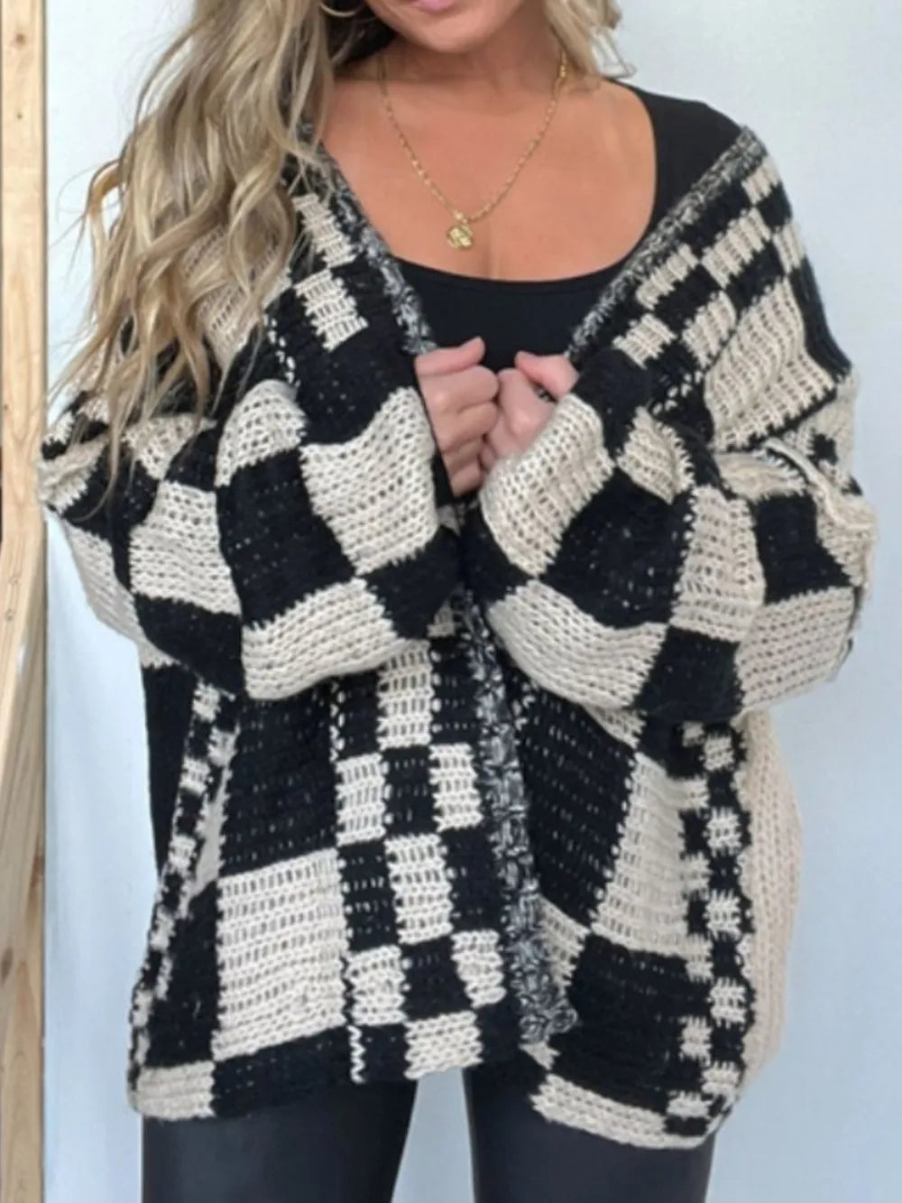 Plaid open-front long sleeve cardigan in black, cream, and light beige knit