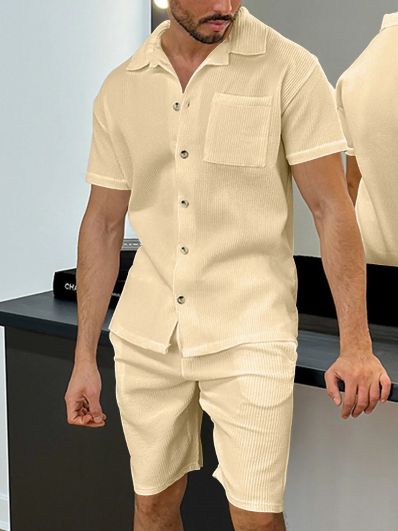 Men's beige button-up short-sleeve shirt with chest pocket and matching shorts