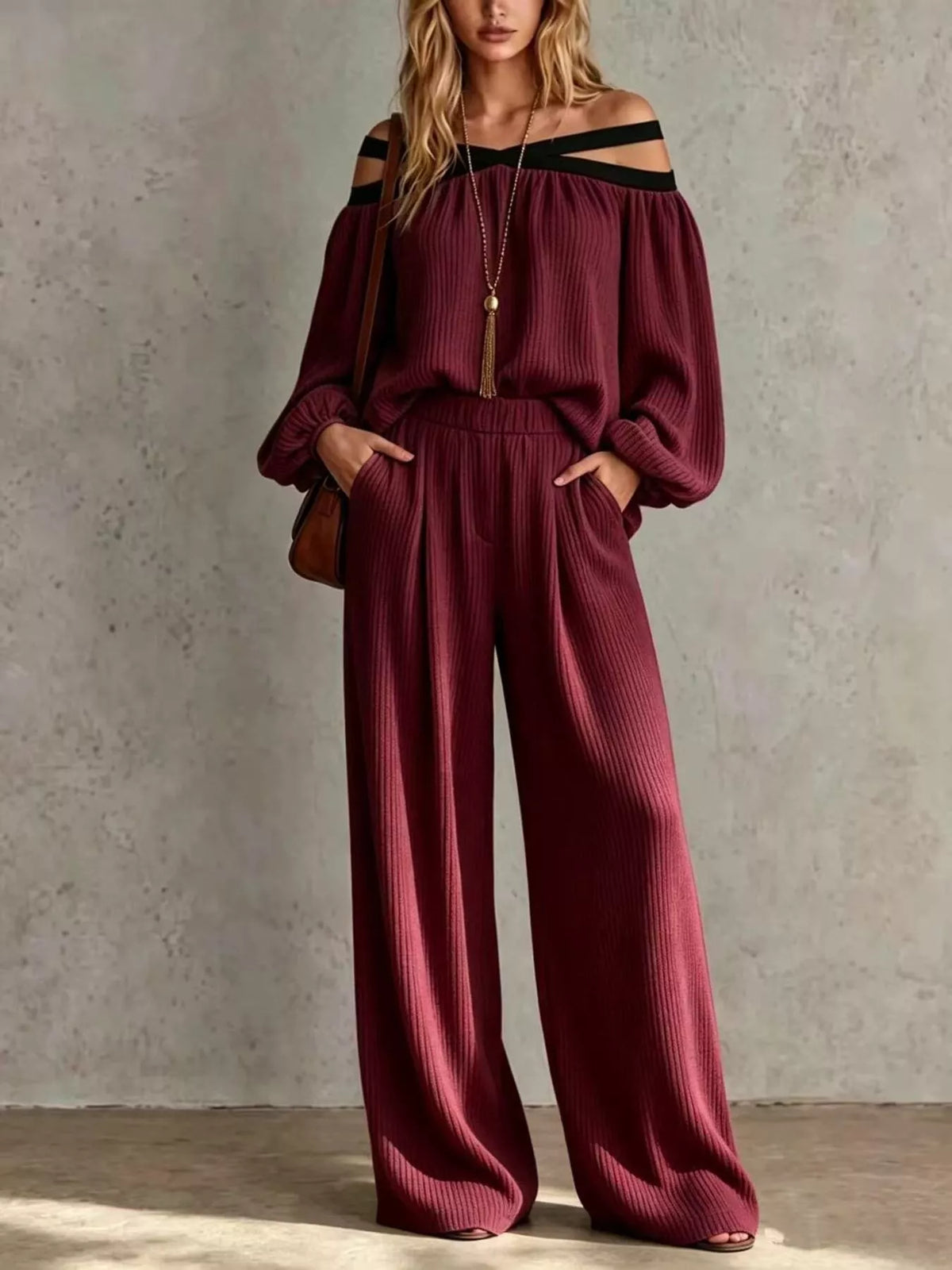 Burgundy off-shoulder ribbed knit set with long sleeves and wide-leg pants