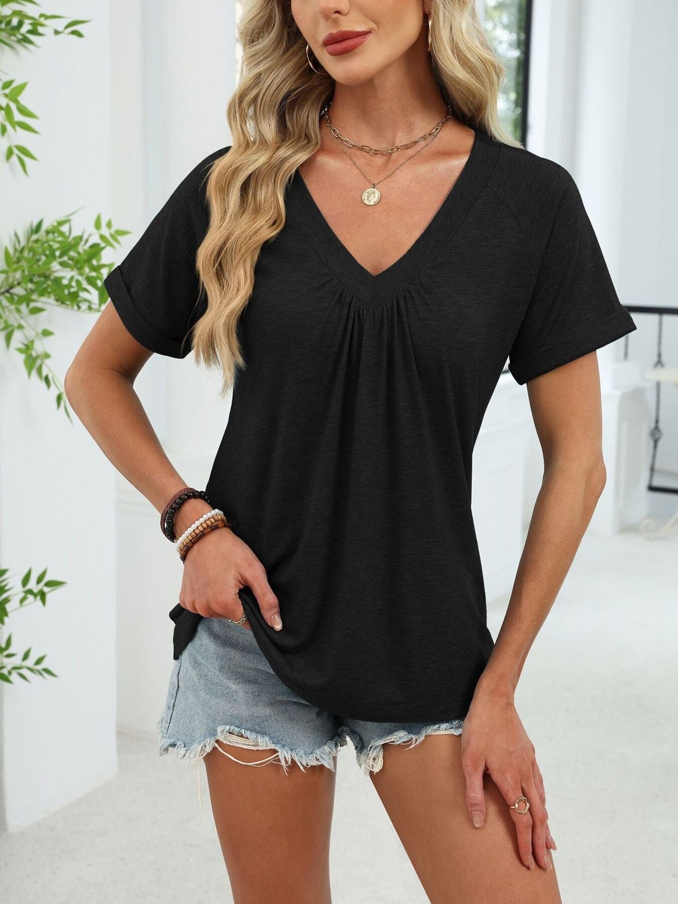Cedar & Moore casual black V-neck short-sleeve tee with ruched front detail