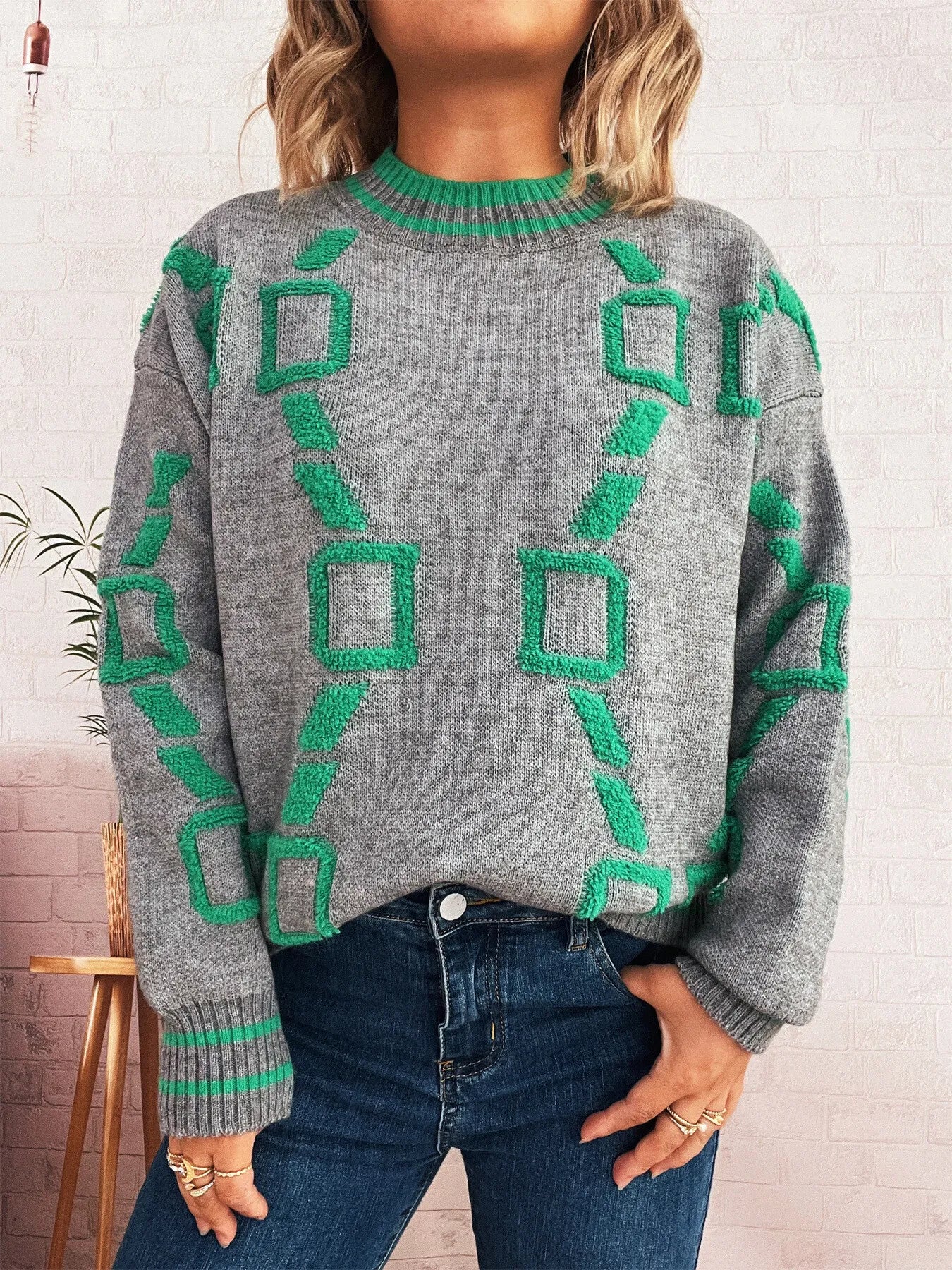 Heather gray long-sleeve sweater with green geometric motif and ribbed cuffs