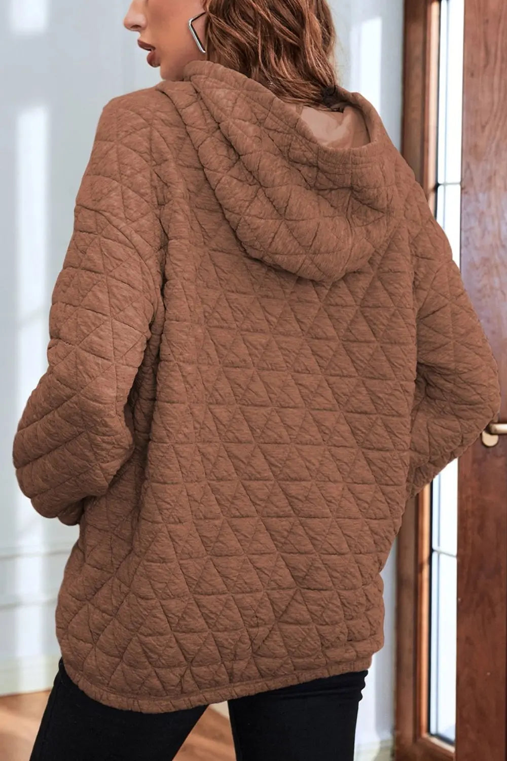 Brown quilted long-sleeve hoodie with hood, back view