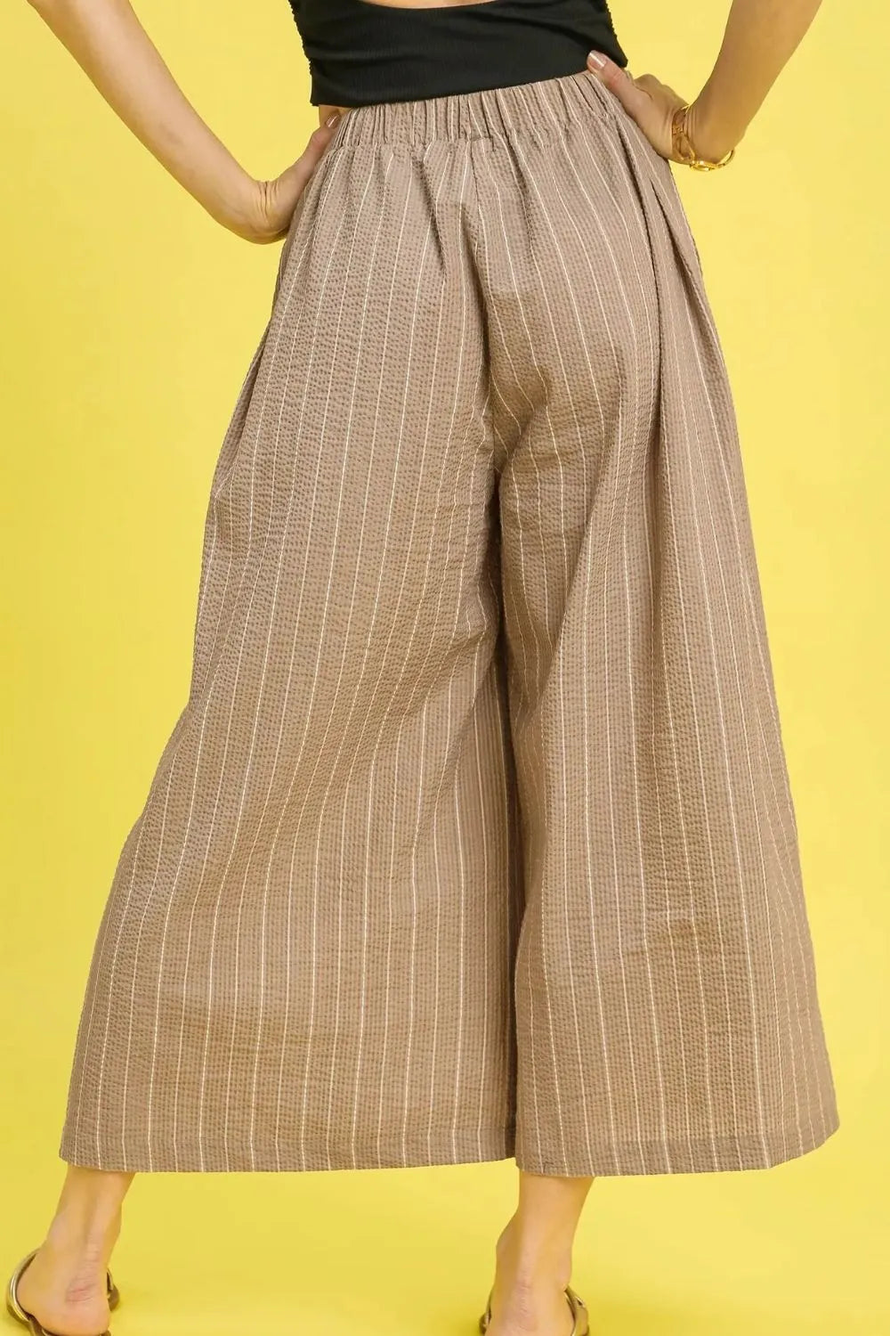 Camel pinstripe palazzo pants with elastic waistband and wide cropped legs