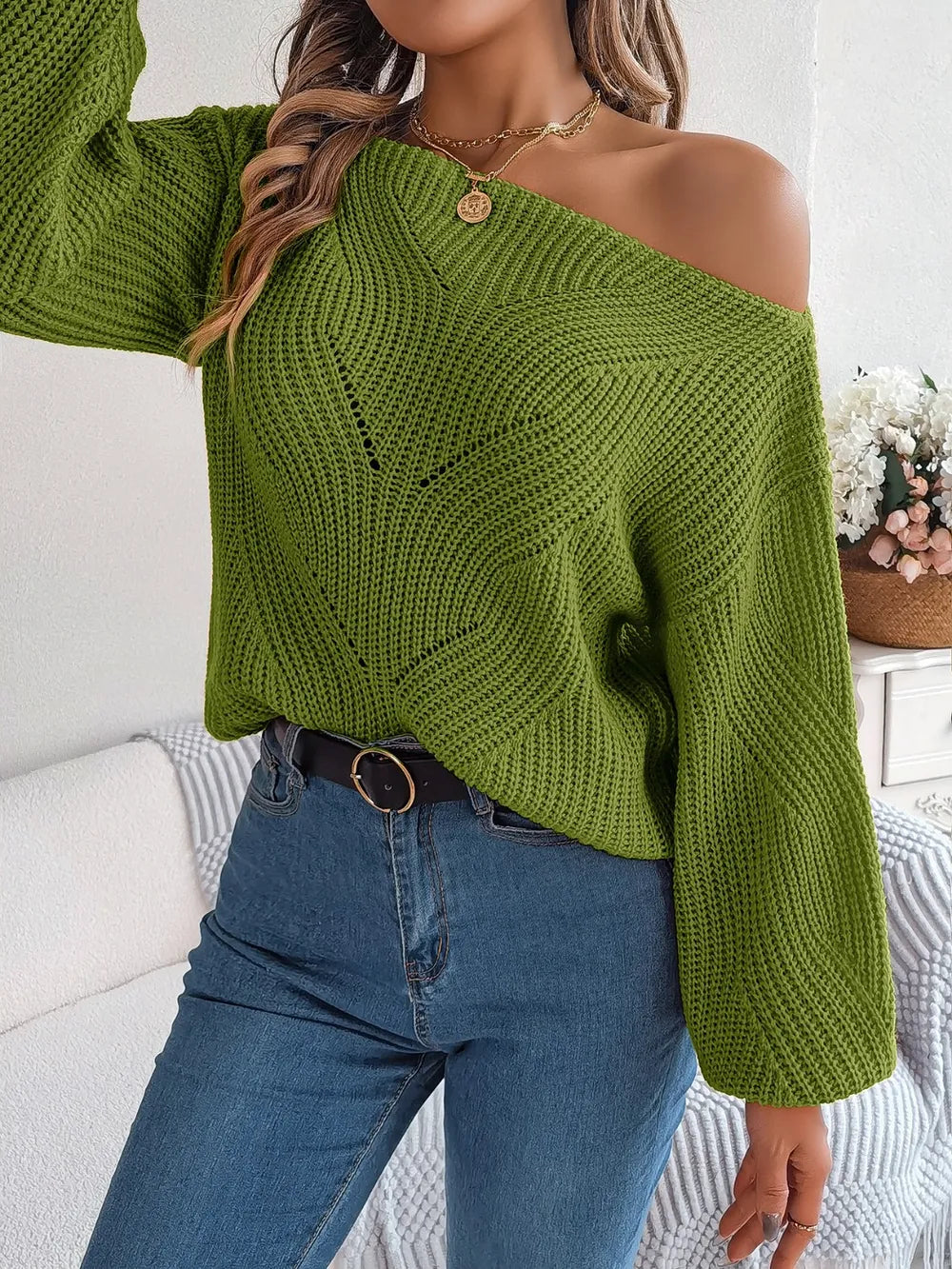 Moss green openwork long sleeve sweater with off-shoulder neckline and small front button placket.