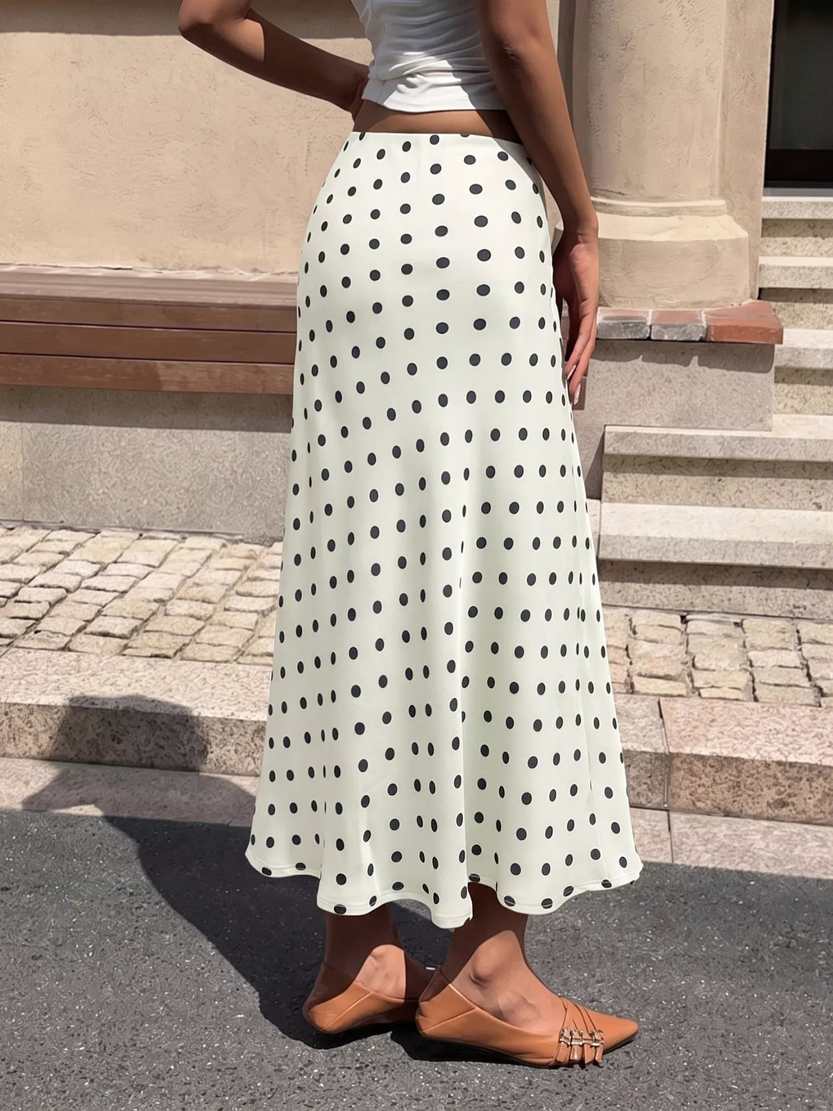 Beige polka dot stretch midi skirt, full length with elastic waistband