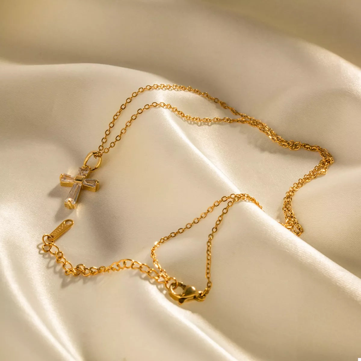 Gold-plated zircon cross necklace with faceted cross pendant and gold link chain