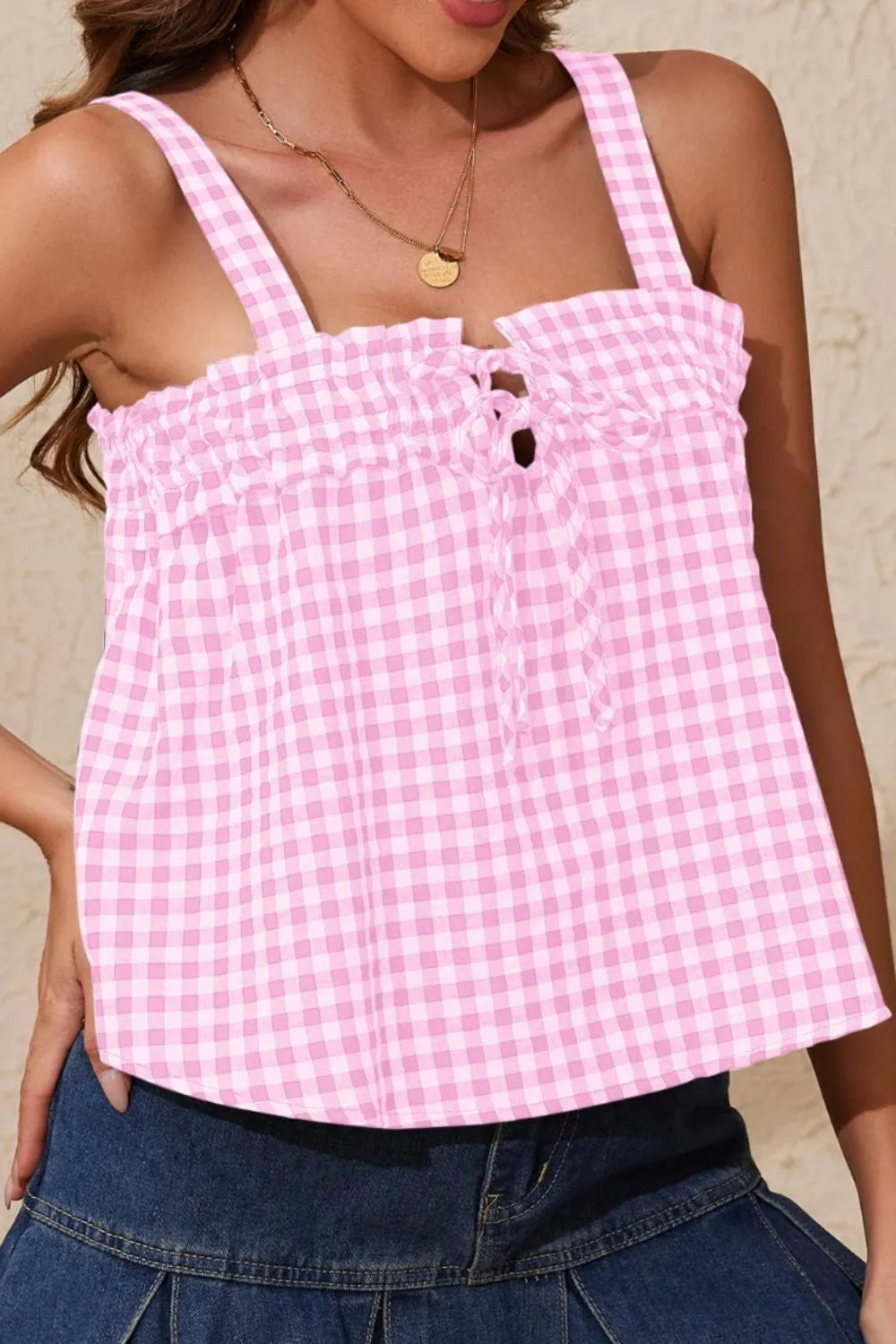 Pink gingham square-neck cami with ruffled bodice and buttoned center
