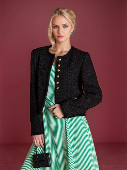 Black textured long-sleeve outerwear with gold-tone button front, open neckline