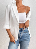 White one-button lapel blazer with 3/4 sleeves and front pockets