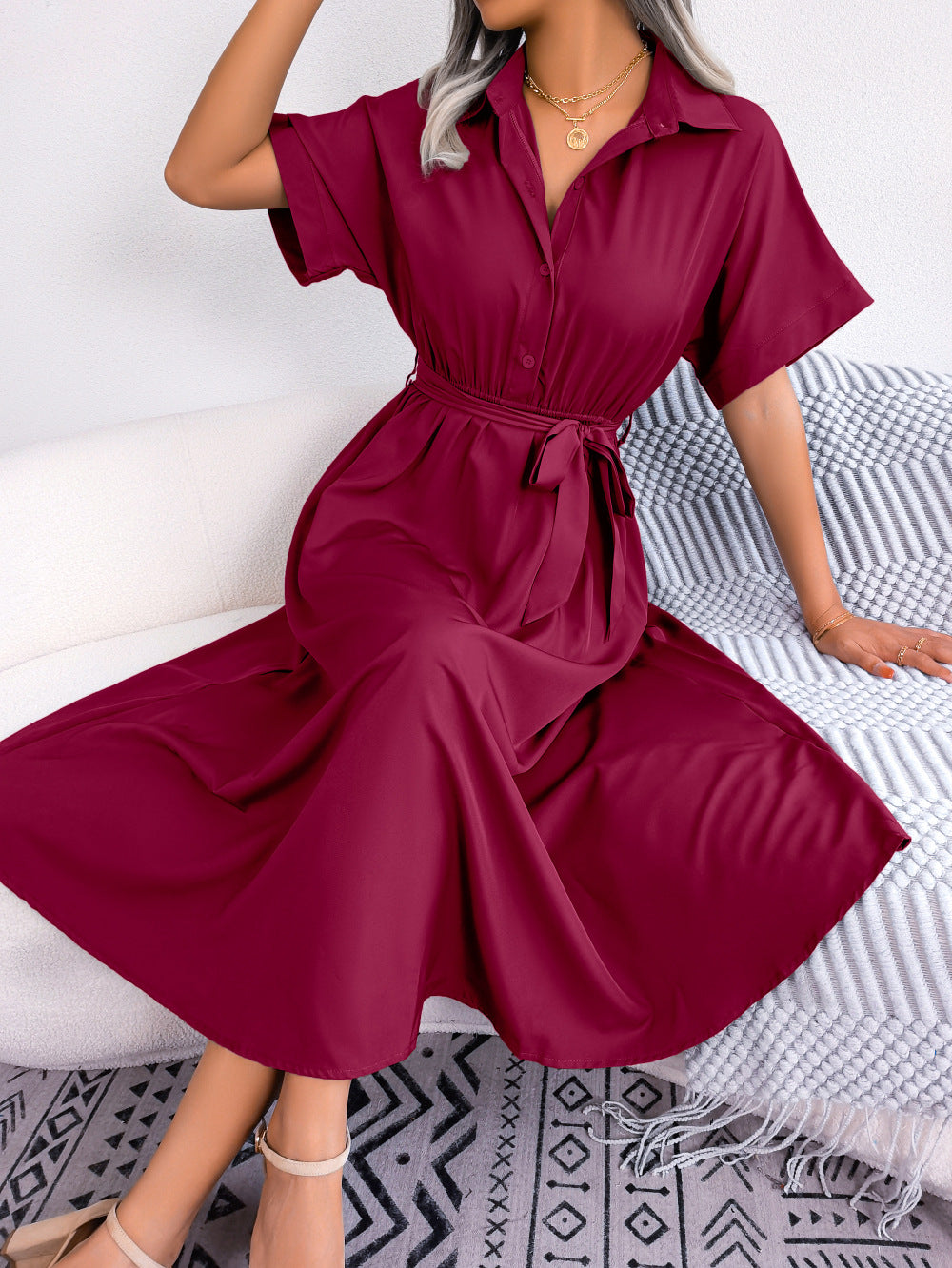 Burgundy short-sleeve collared tie belt dress with button front and gathered skirt