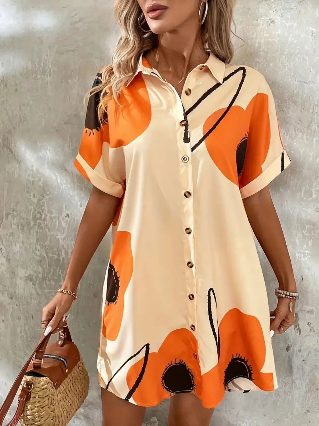 Printed button-front shirt dress by Trendsi in cream with orange abstract print, short sleeves.