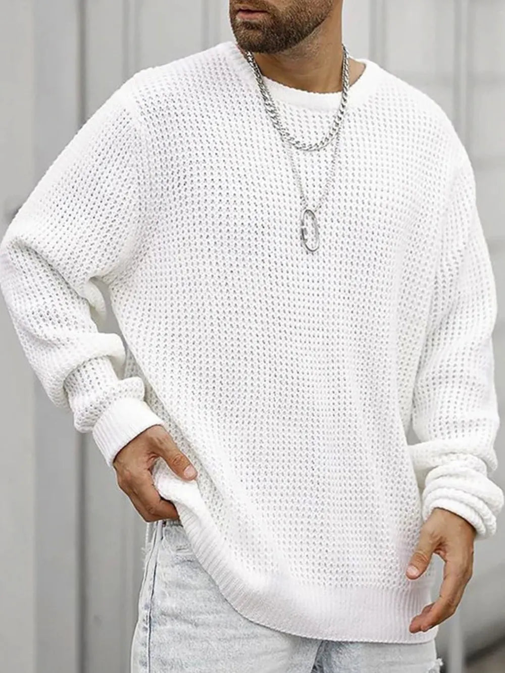 White crewneck long-sleeve knit sweater with ribbed cuffs and hem