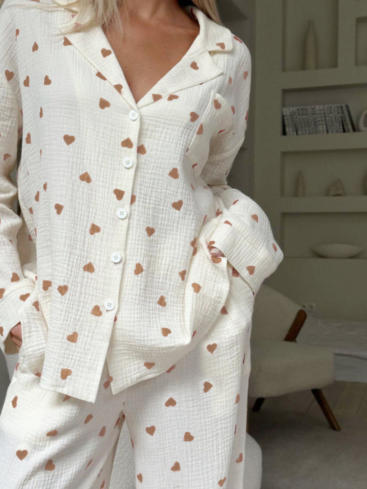 Cream heart-print button-front lounge top with long sleeves and relaxed fit