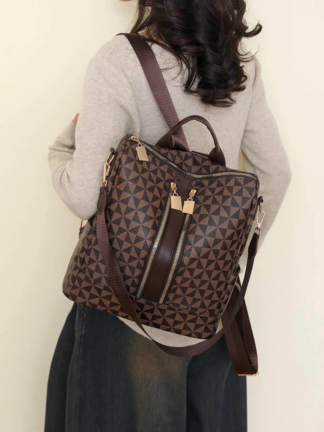 Geometric pattern backpack bag in brown, front zipper, top handle and shoulder straps