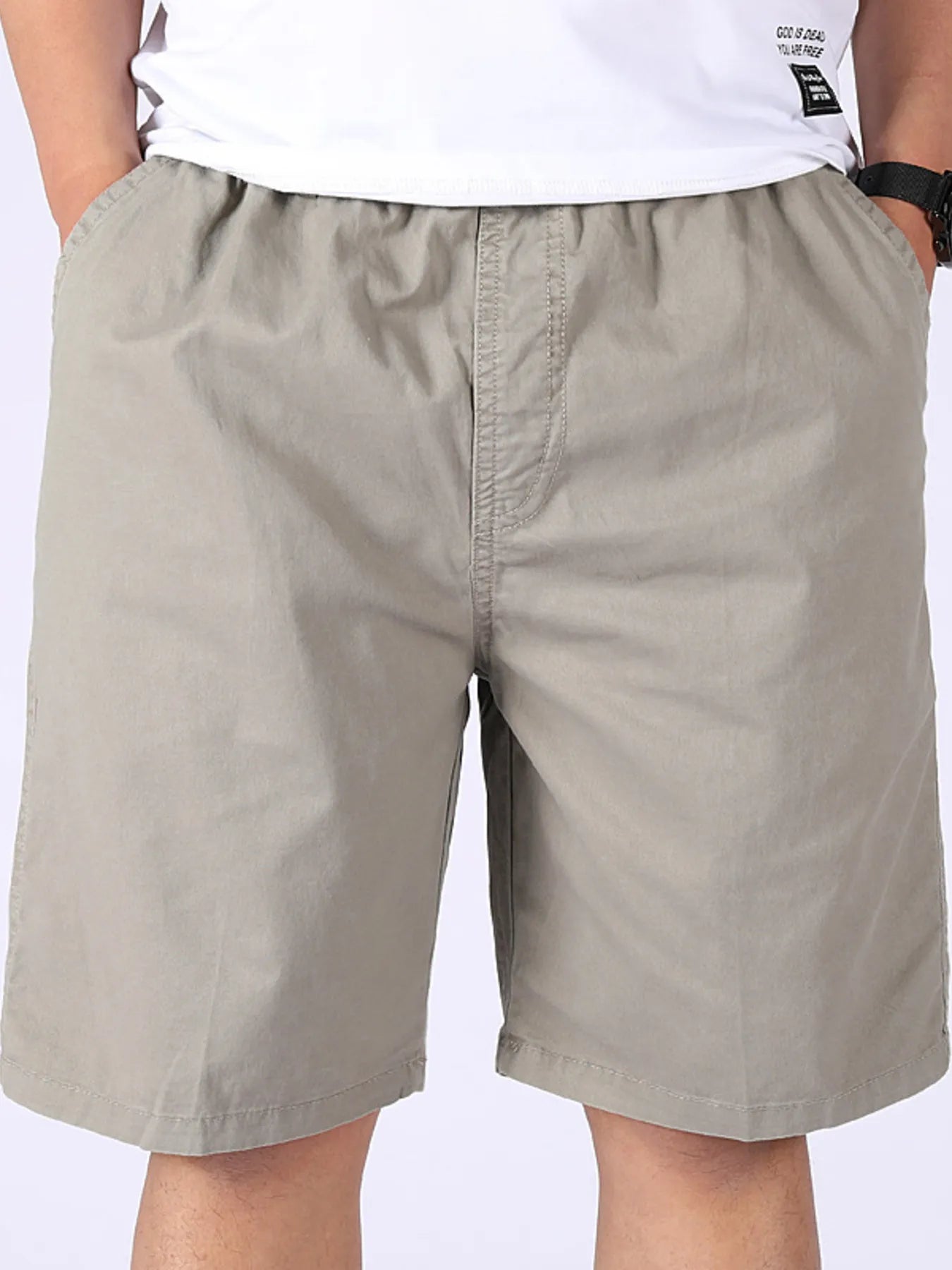 Men's plus-size khaki pocketed shorts with zip fly, belt loops, and side pockets