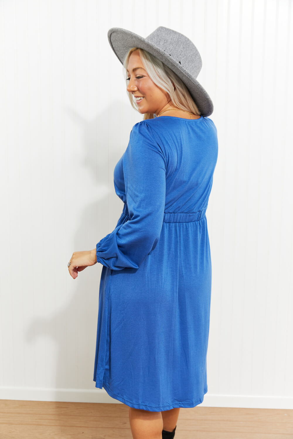Scoop-neck empire-waist mini dress with long sleeves and button front, blue