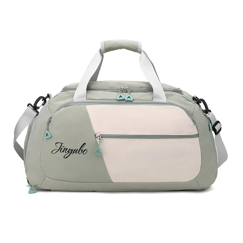 Large nylon travel duffel bag in sage green with contrast off-white front panel and top handle