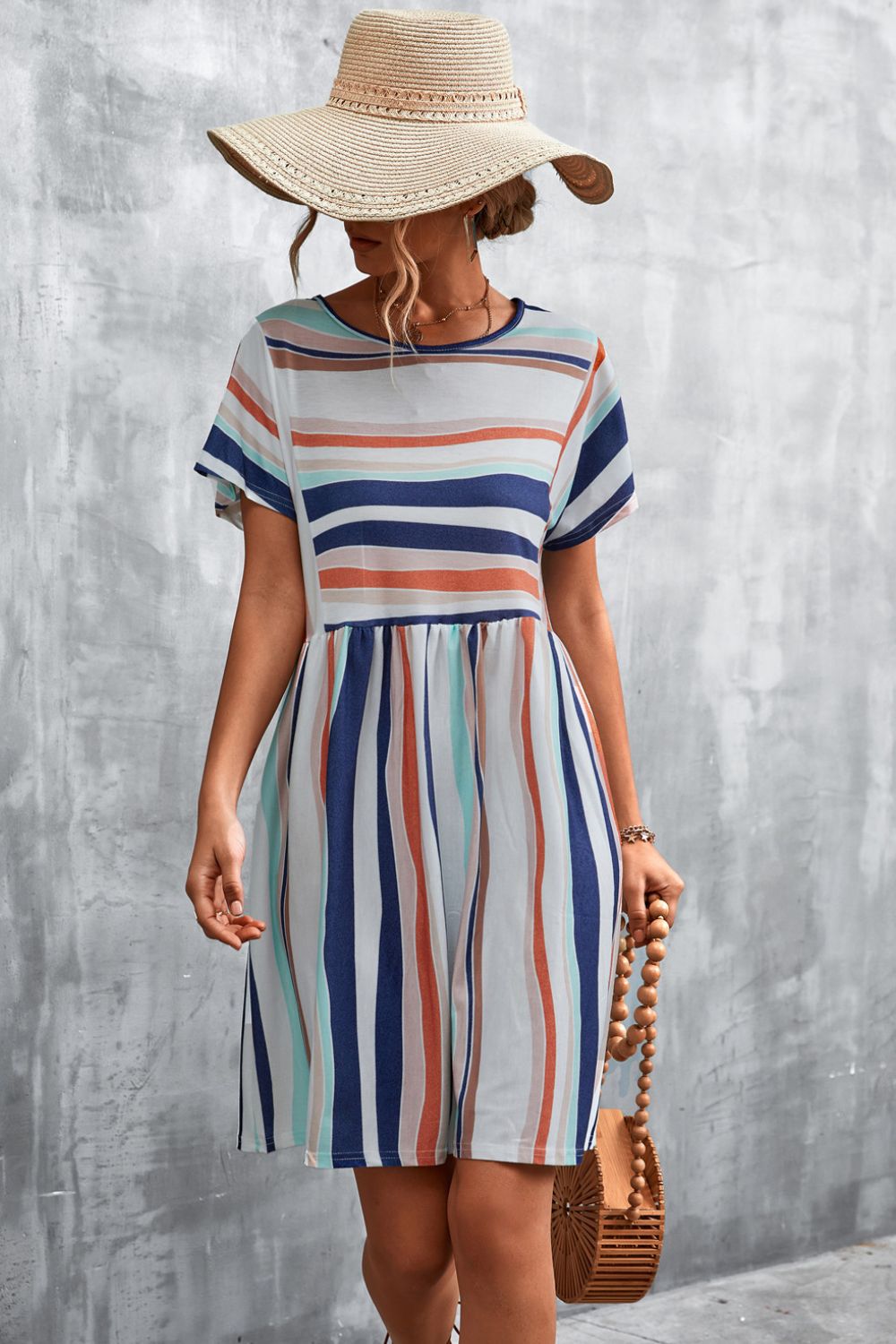 Striped round-neck dress with short sleeves and gathered waist, vertical multi-color stripes