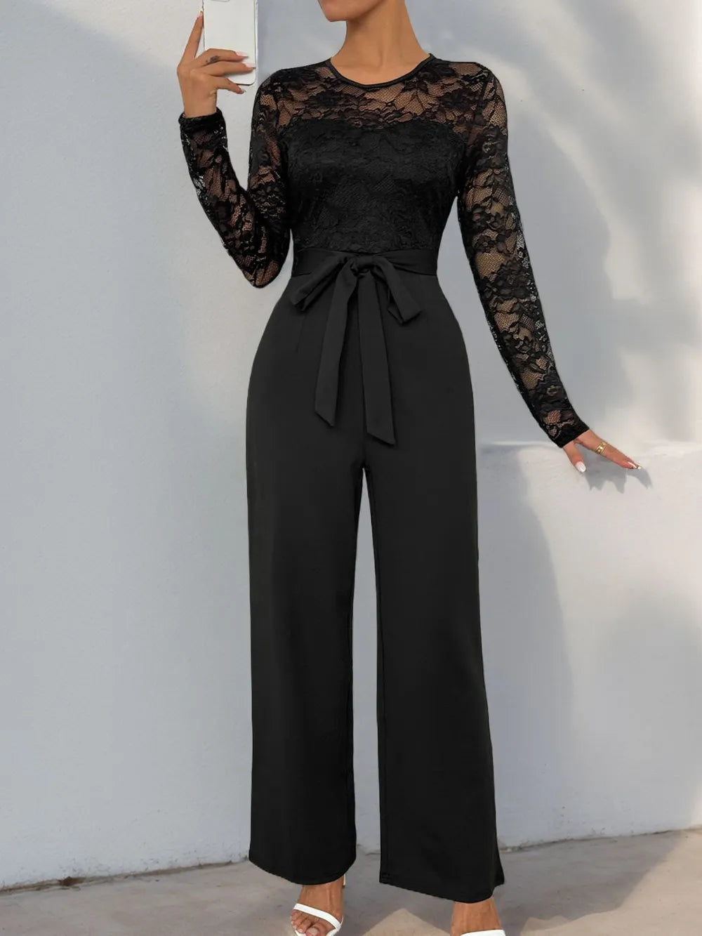 Black lace long-sleeve jumpsuit with round neck and waist tie, wide-leg pants