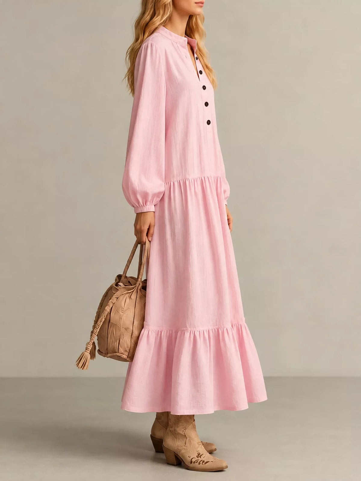 Pink tiered button-front maxi dress with long puff sleeves, side view