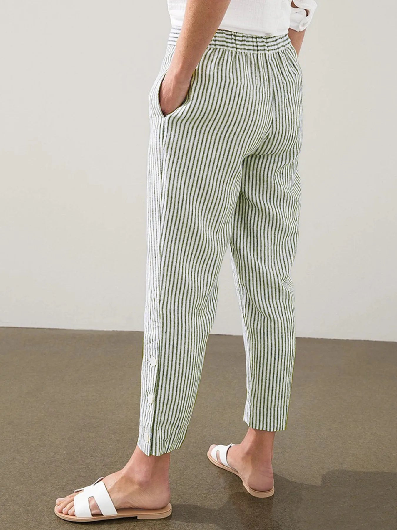 Striped pull-on pants with side buttons, light green and white, ankle length