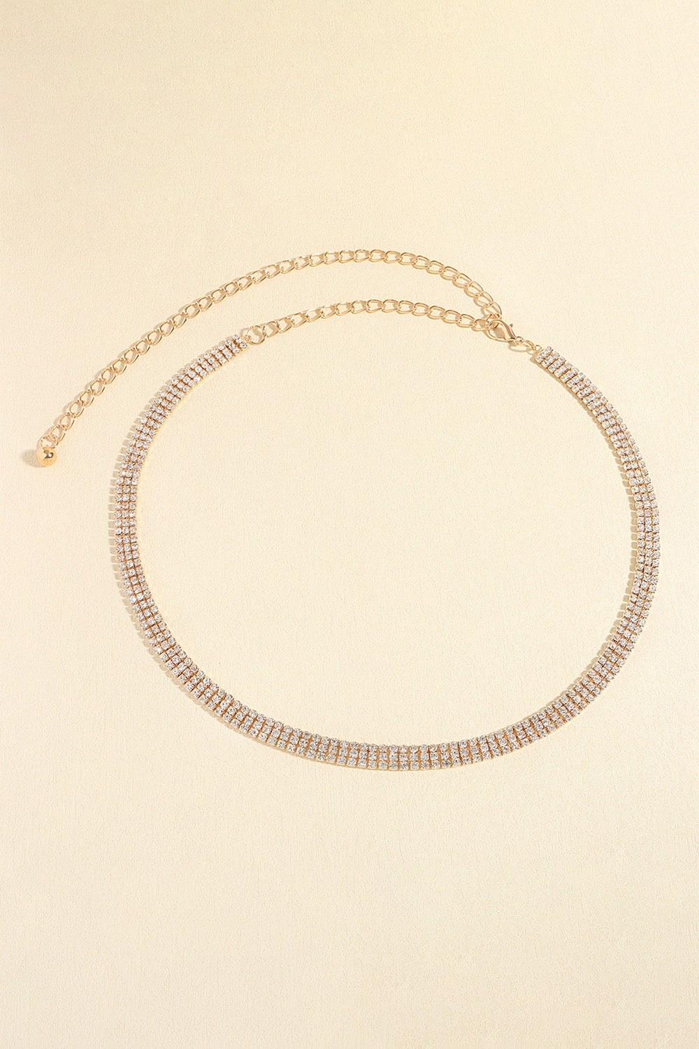 Gold-toned rhinestone alloy belt, round studded chain with small tail