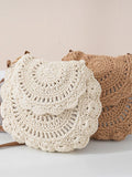 Off-white crochet crossbody bag with layered flap design and braided strap.