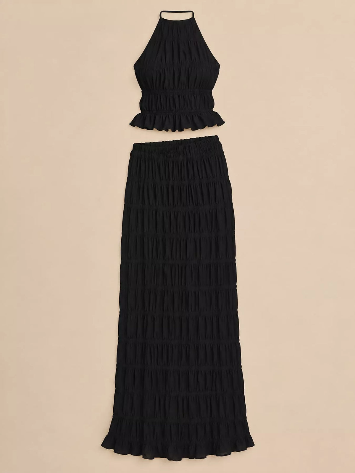 Black halter neck ruffle crop top and long tiered maxi skirt set