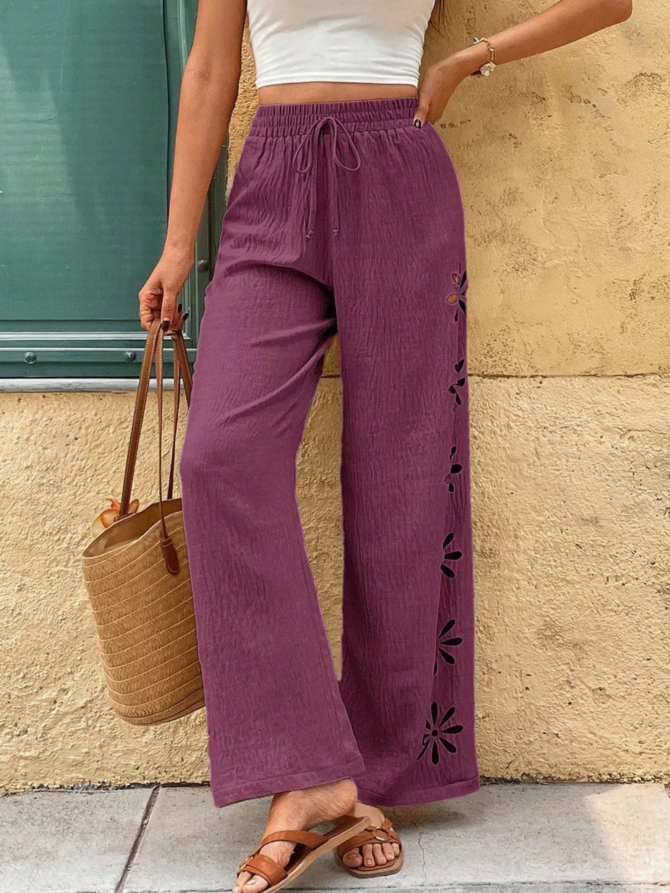 Purple wide-leg pants with drawstring waist and side cutout flower embroidery