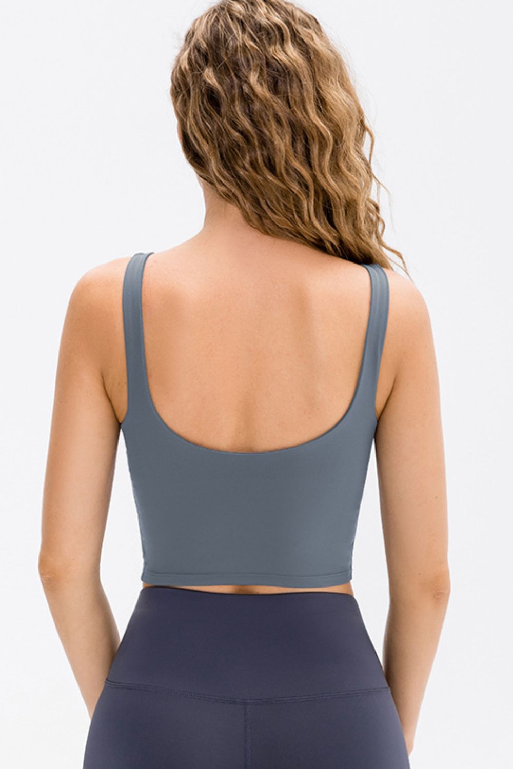 Cropped scoop neck active tank top, blue; scoop back with racerback straps.