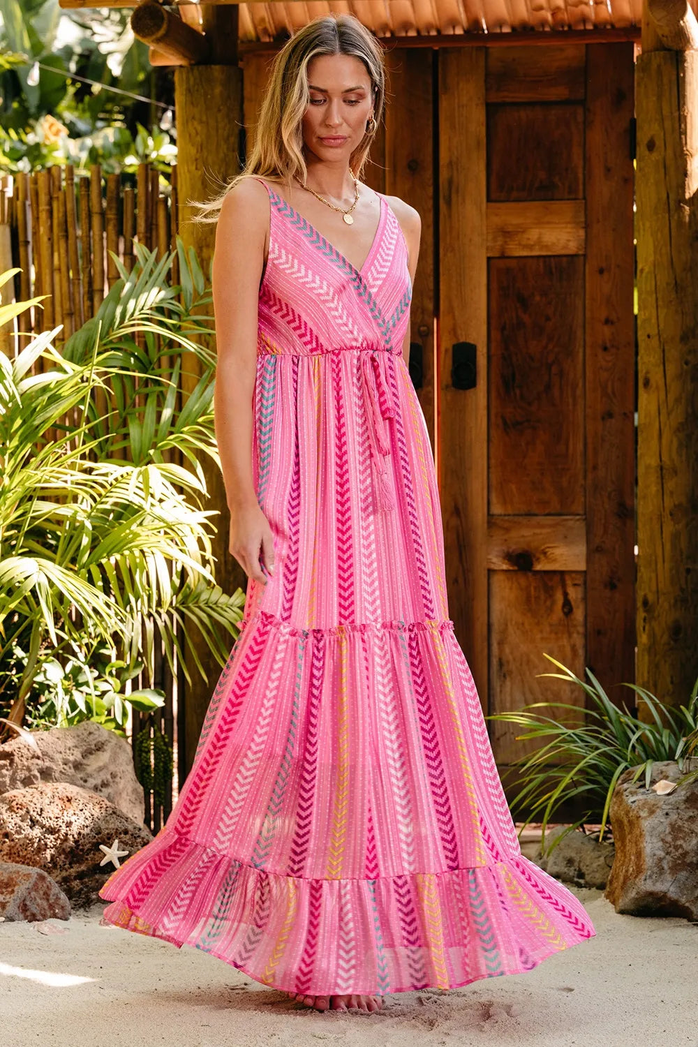 Pink printed maxi cami dress with surplice V-neck and flowing tiered skirt