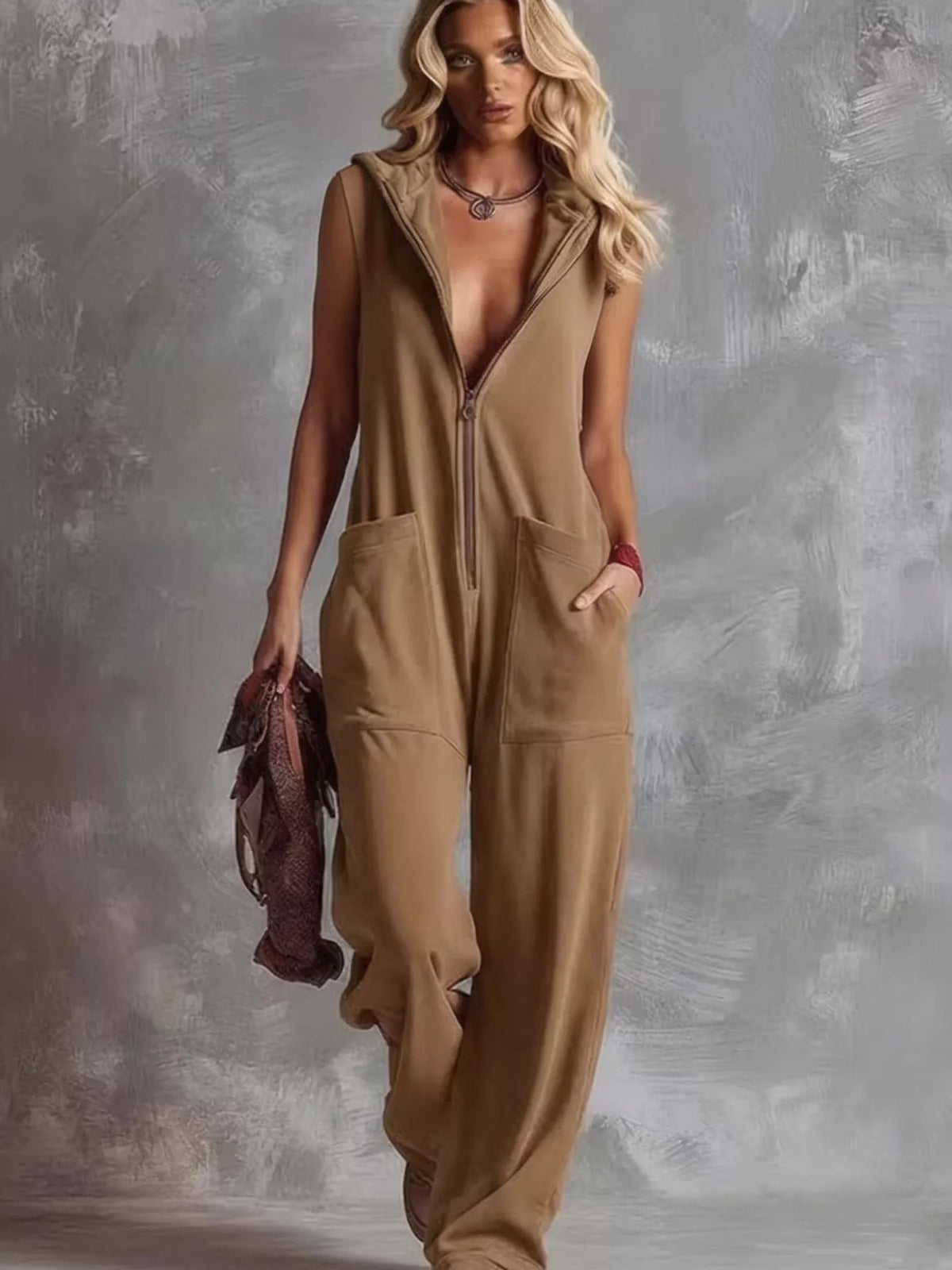 Dark khaki sleeveless hooded zip pocket jumpsuit with front patch pockets and draped legs