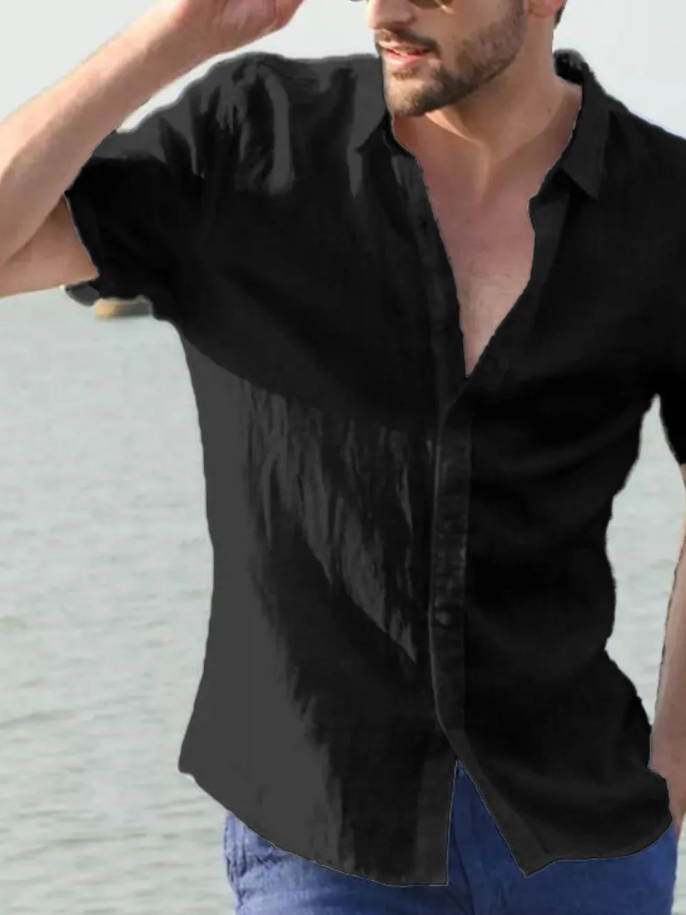 Men's short-sleeve button-down shirt, black, open collar with front buttons
