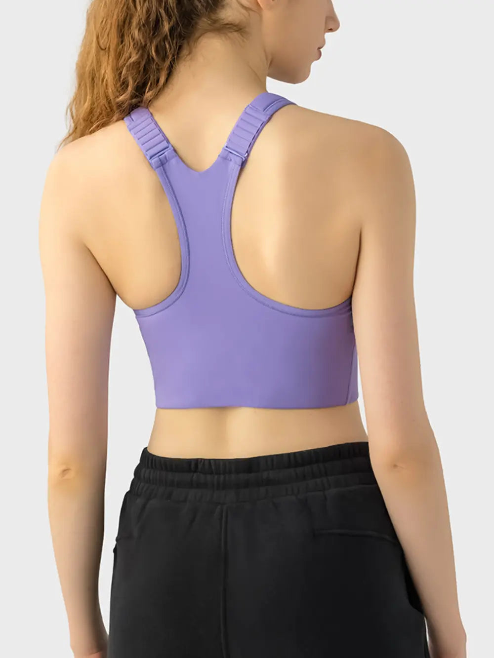 Purple sport bra back view with wide straps and racerback
