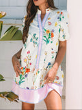 Trendsi Floral Print Notched Short Sleeve Dress; white base with multicolor flowers and pink-blue trim