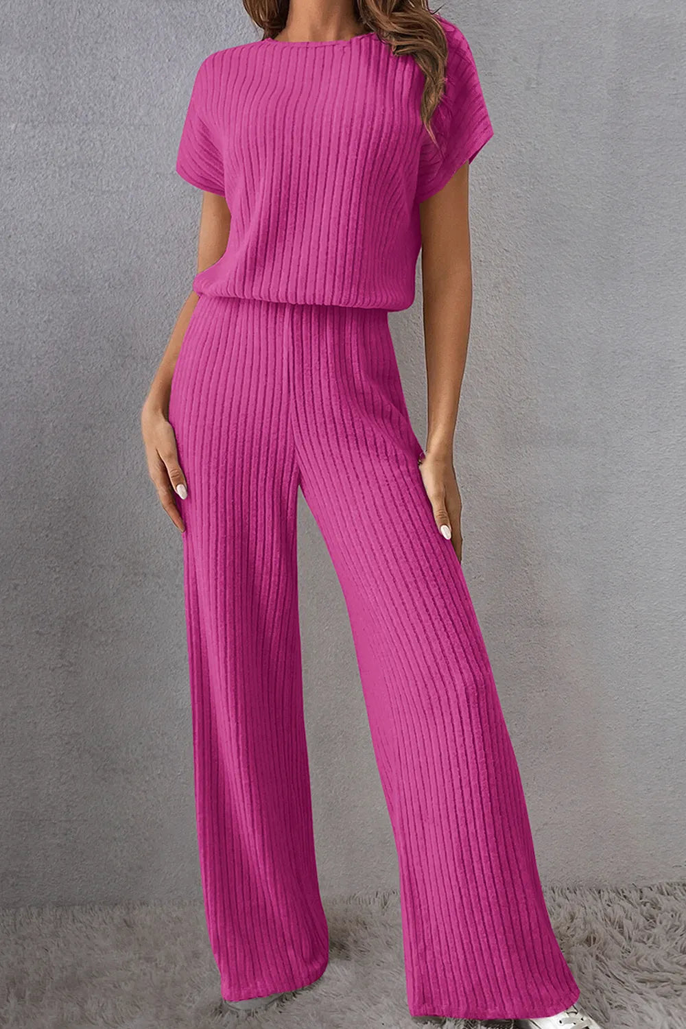 Hot pink ribbed round-neck short-sleeve jumpsuit with wide legs