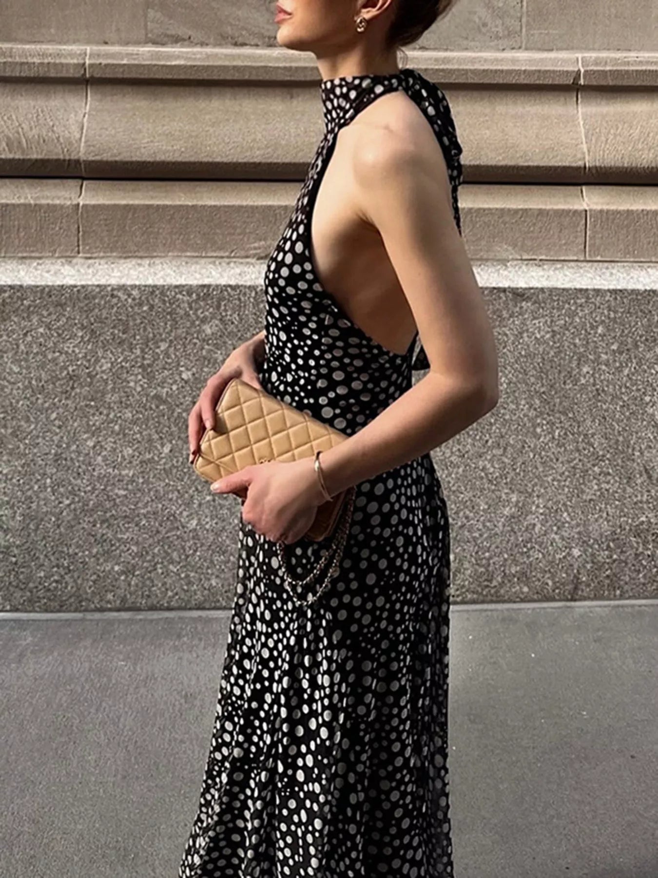 Cedar & Moore Halter Neck Polka Dot Maxi Dress in black with white dots, tied halter neckline
