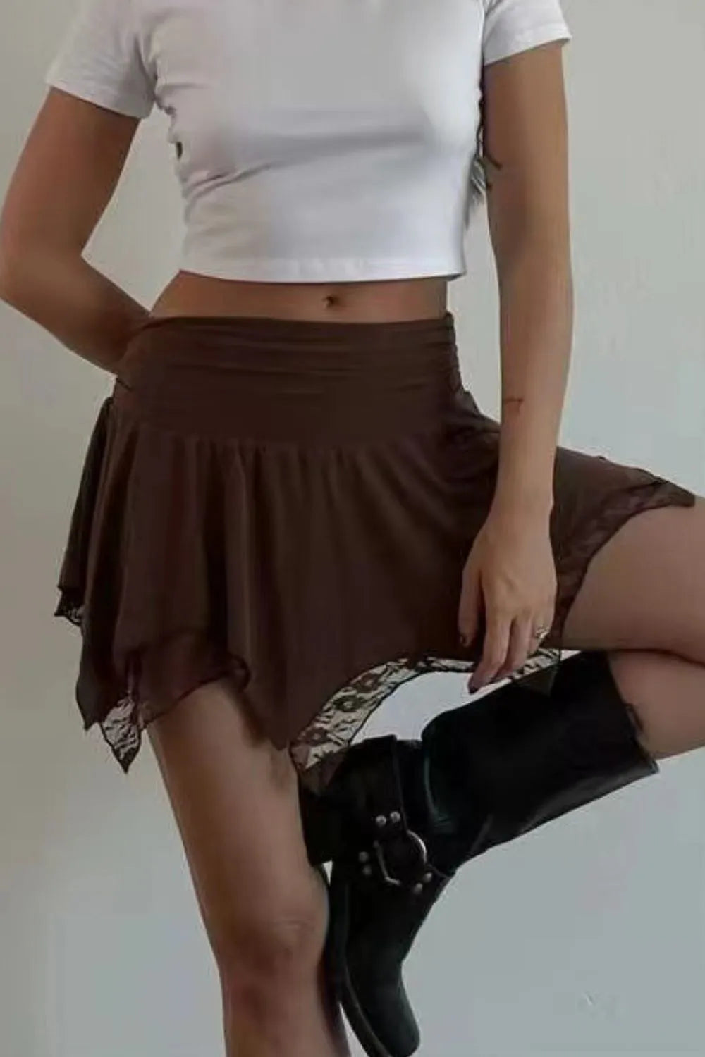 Dark brown lace mini skirt with gathered waist and layered asymmetric hem