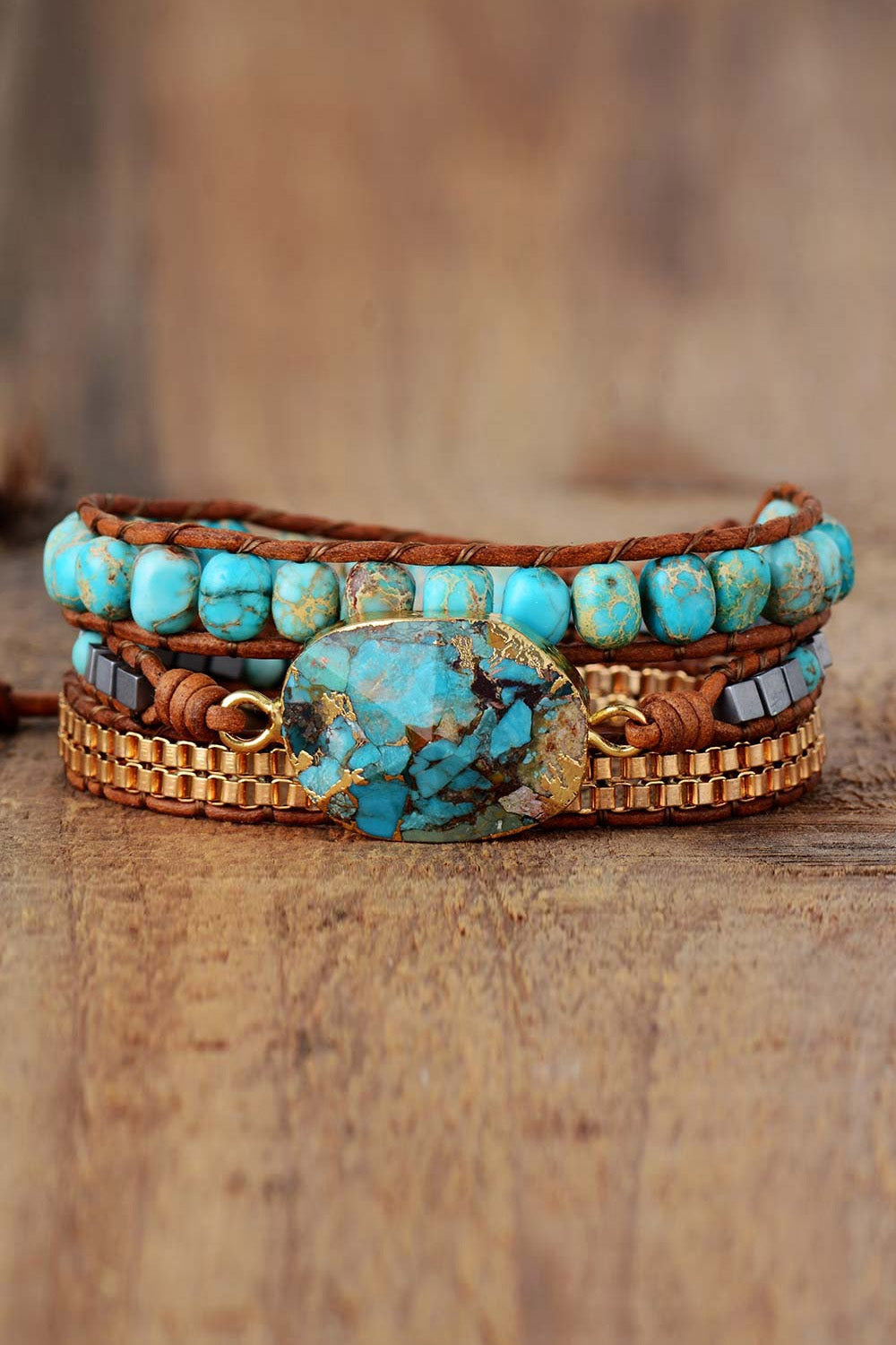 Turquoise stone leather wrap bracelet with oval turquoise cabochon and copper bead rows