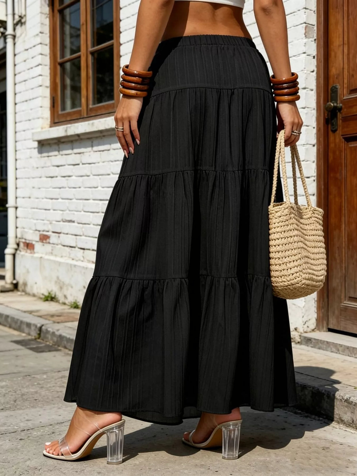 Black tiered maxi skirt with gathered tiers and elastic drawstring waist
