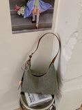 Medium woven shoulder bag with tassel, textured gray fabric and brown handle straps