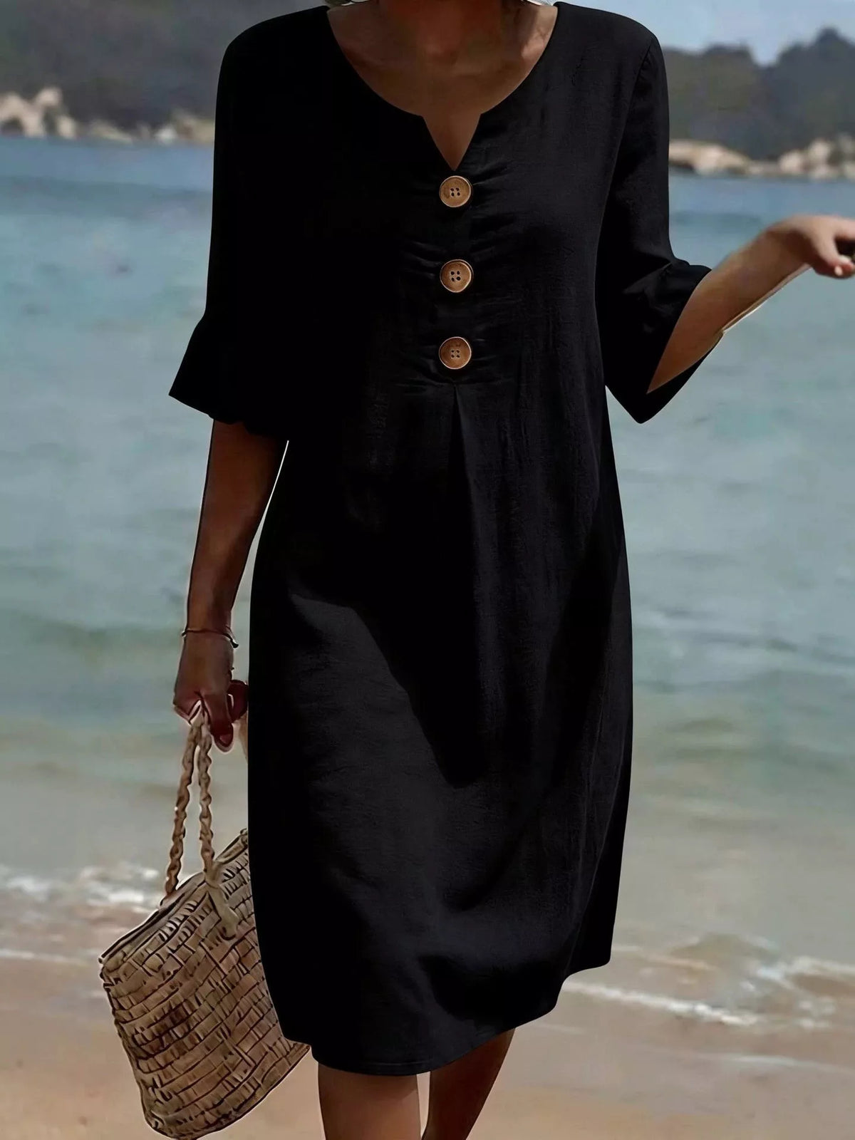 Black V-neck button-front midi shift dress with ruffle sleeves and three wood-tone buttons
