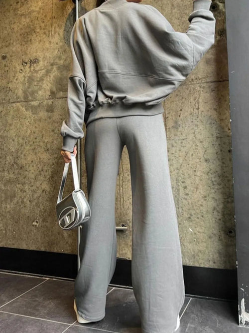 Gray zip-up baseball collar top with drawstring pants set, back view