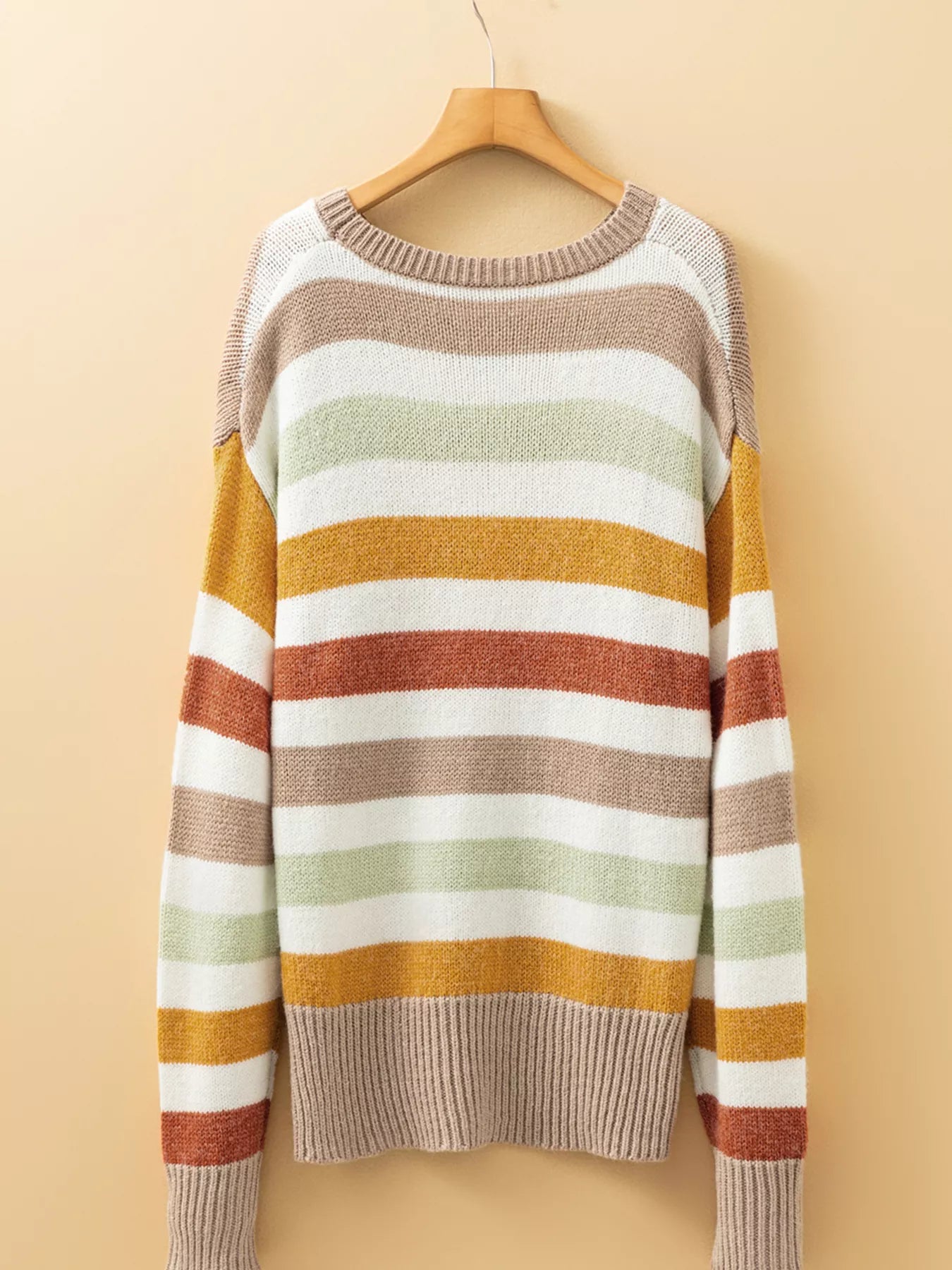 Multicolour striped crew neck sweater with relaxed shoulders and ribbed bottom hem