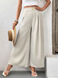 Beige wide-leg pleated pants with side slit and front waistband button