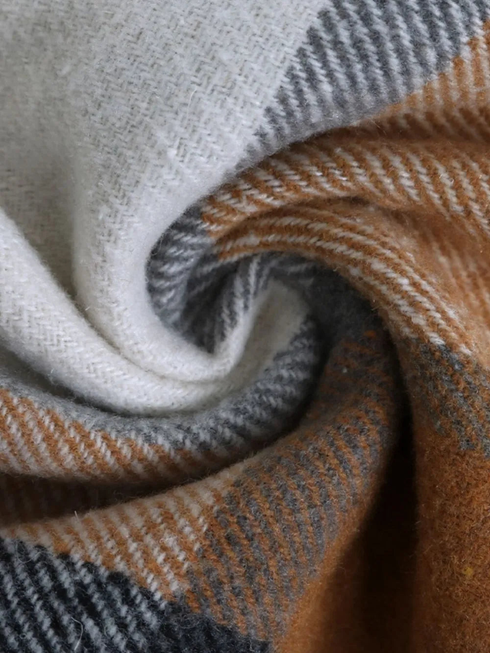 Camel and white plaid woven fabric close-up