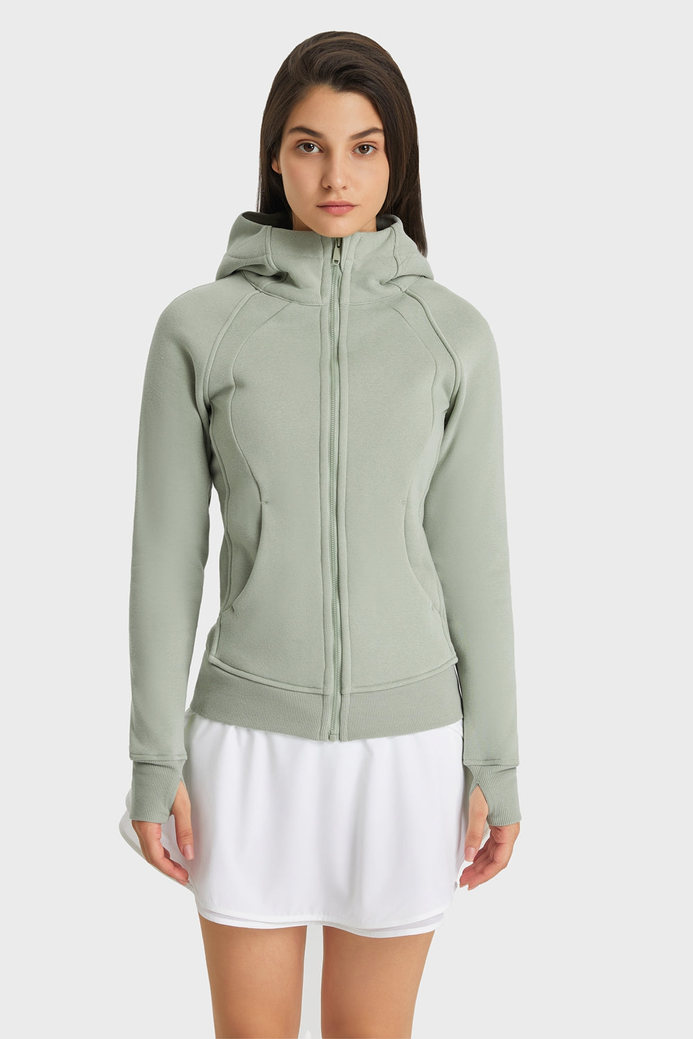 Green zip-up hooded sports jacket with long sleeves and front zipper