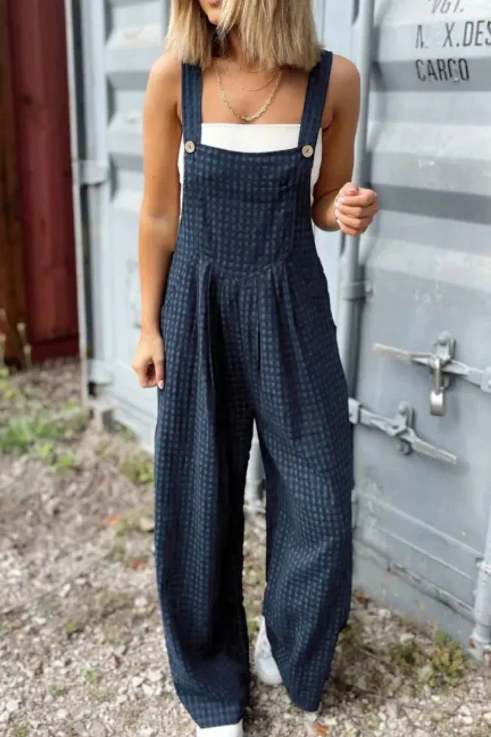 Dark blue plaid wide-leg overalls with wide straps and button bib