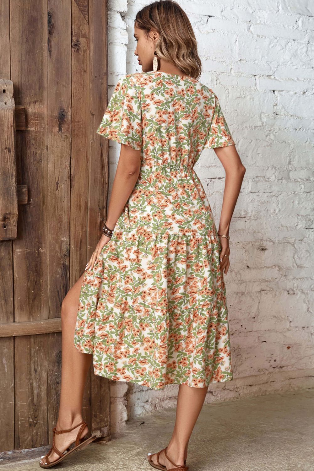 Floral V-neck front slit dress, back view with gathered waist