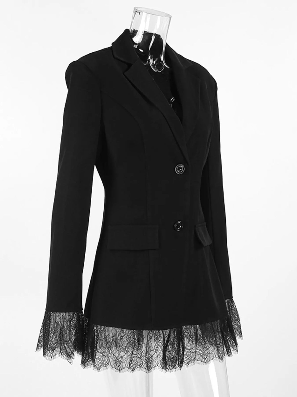 Black blazer product view with lace hem trim, flap pockets, and single-button front.